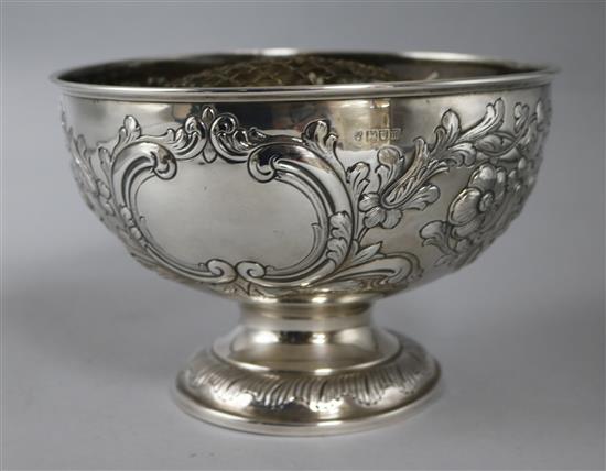 An Edwardian repousse silver rose bowl by Charles Stuart Harris & Son, London, 1907, 11.5 oz.